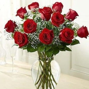 One Dozen Roses In Vase With Baby's Breath