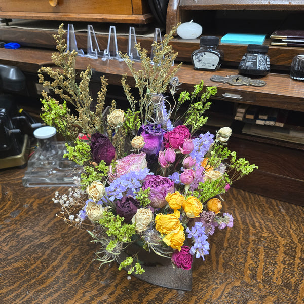 Antique Iron With Dried Flower Arrangement