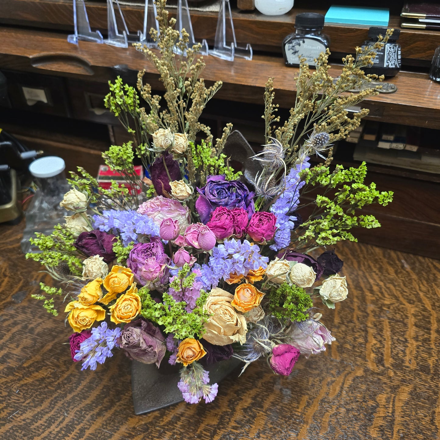 Antique Iron With Dried Flower Arrangement