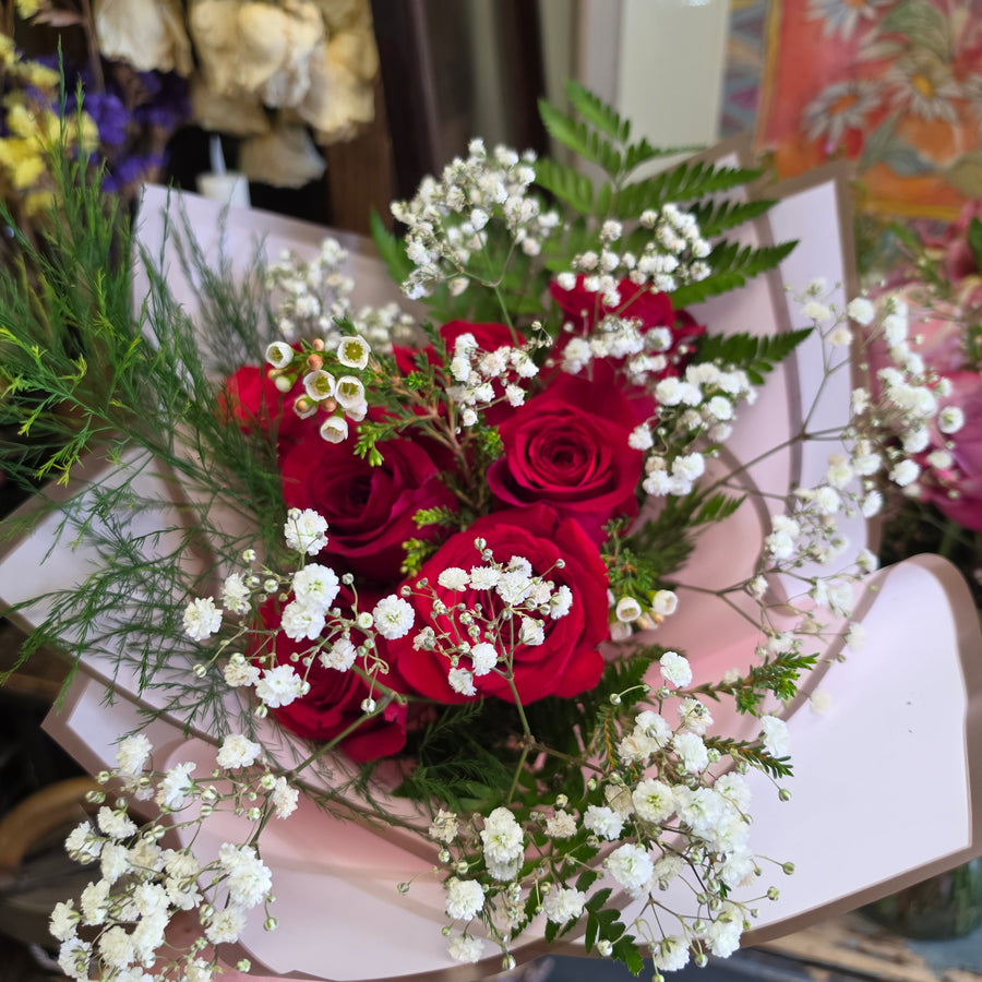 Hand Tied Premium Rose Boquet (7 roses with baby's breath and greens)