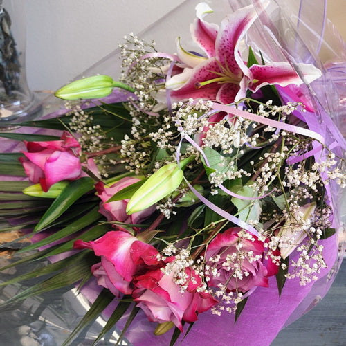 Hand Tied Bouquet To Go - 4 (Purple & Red Roses, Pink Lilies, and Baby's Breath)