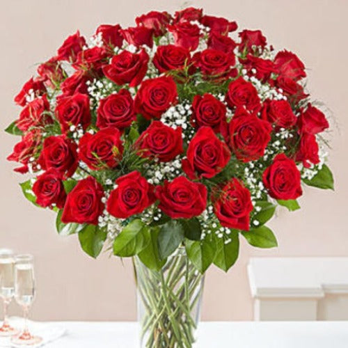 Saint Valentin Love Royale (50 roses dans un vase)