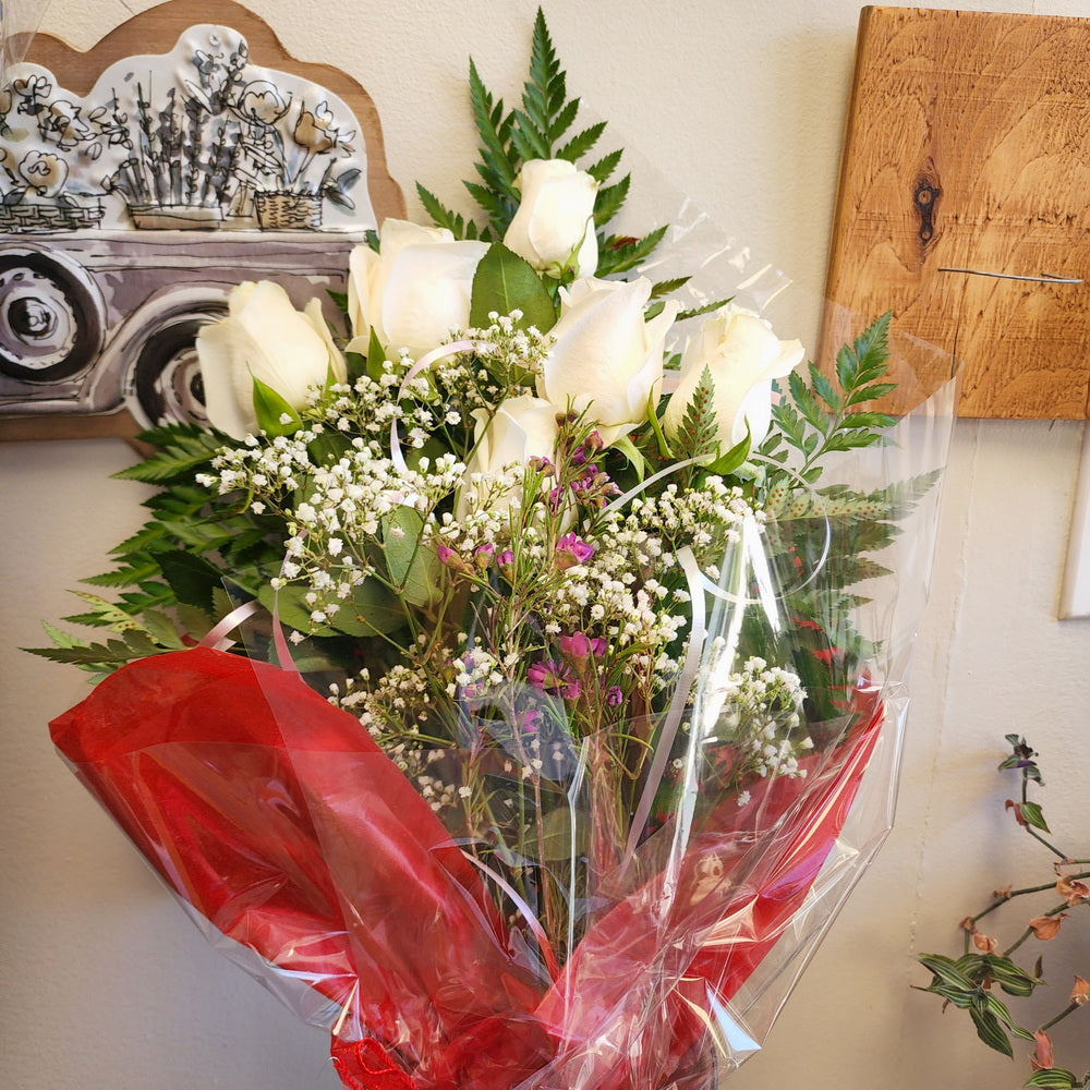 Hand Tied Bouquet To Go - 1 (White Roses with Baby's Breath and Wax Flowers)