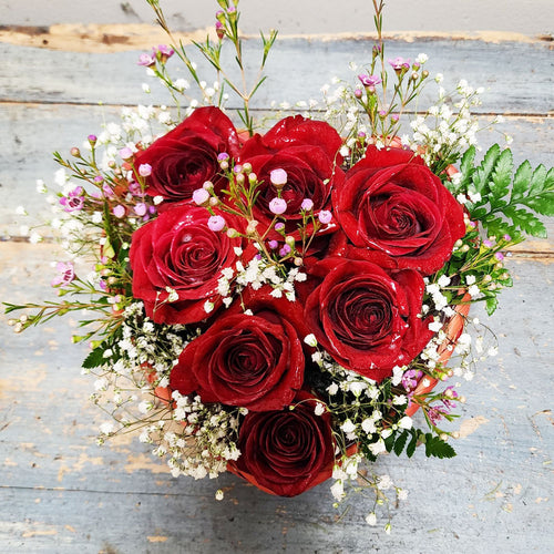 7 Roses in Heart Shaped Basket